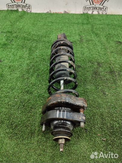 Амортизатор / стойка задний левый Mitsubishi