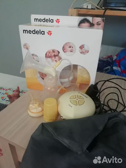 Молокоотсос medela swing электрический