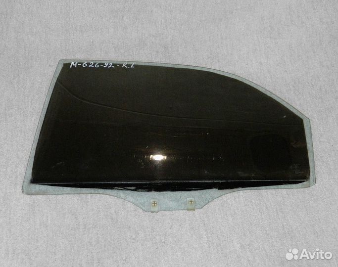 Стекло двери задней левой Mazda 626 GE
