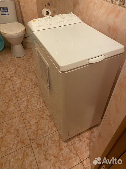 Стиральная машинка с вертикальной загрузкой