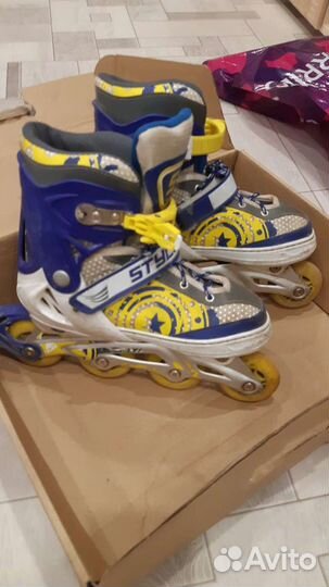 Роликовые коньки