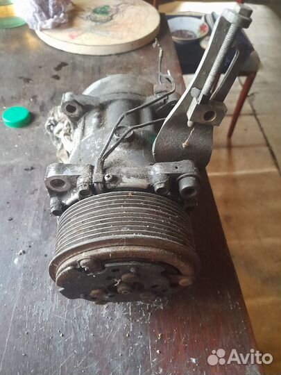 Компрессор кондиционера вольво460