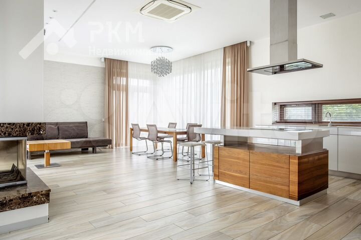 Коттедж 433 м² на участке 18 сот.