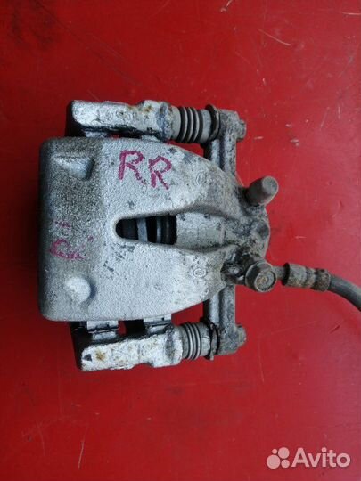 Суппорт тормозной задний правый Toyota Avensis