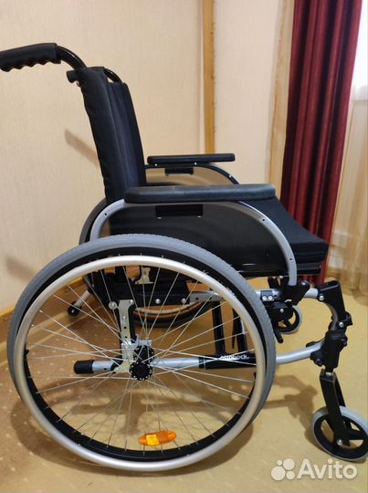 Инвалидная коляска