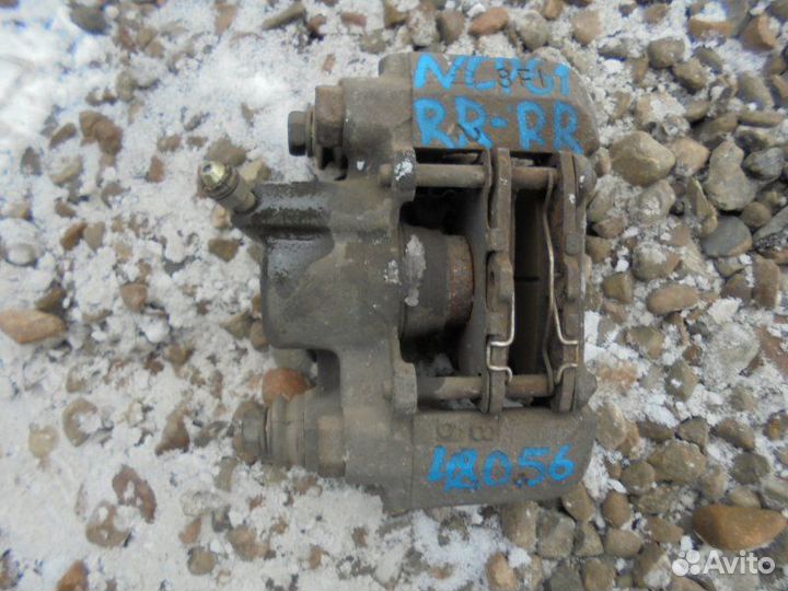 Суппорт задний правый Toyota Ist NCP61 1NZ-FE