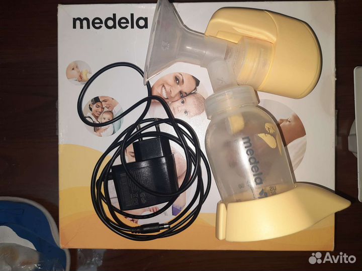 Молокоотсос medela электрический