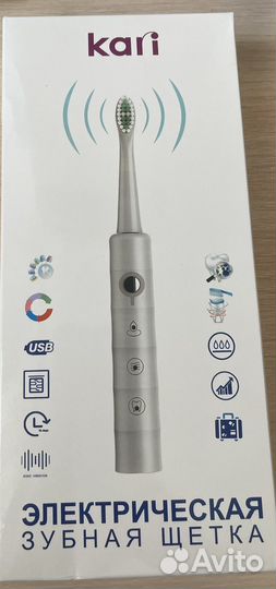 Электрическая зубная щетка