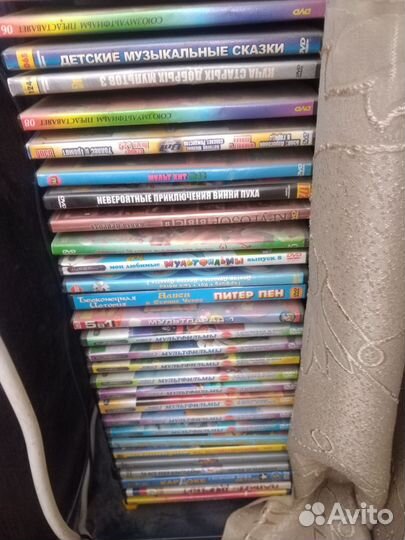 Стойка с дисками мультфильмов
