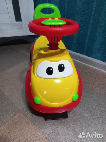 Машинка каталка толокар