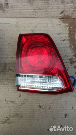 Фонарь левый Toyota Land Cruiser 200