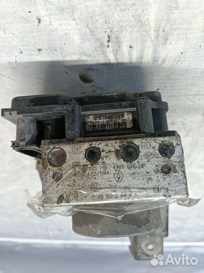 Блок ABS Nissan Almera G15