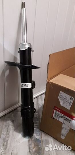 Оригинальный амортизатор передний правый honda