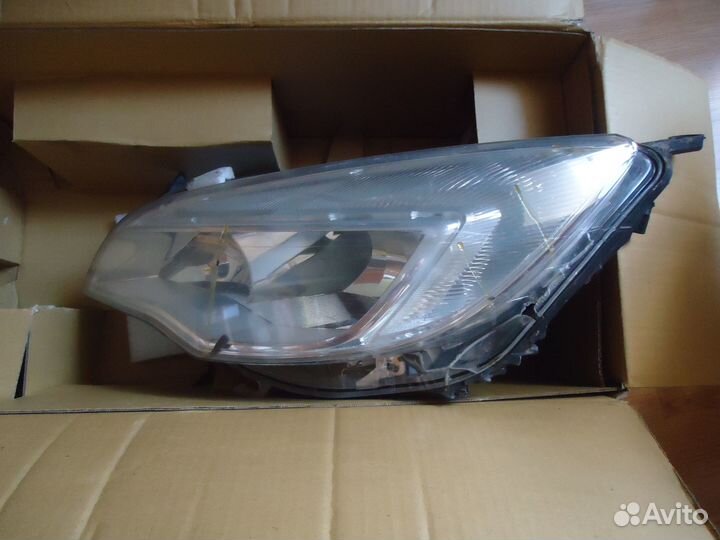 Фара левая opel astra J