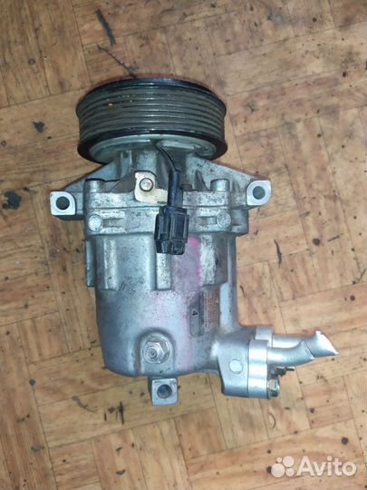 Компрессор кондиционера Nissan 92600CJ70A Y12