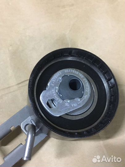 Натяжной ролик ремня грм. Peugeot, Citroen