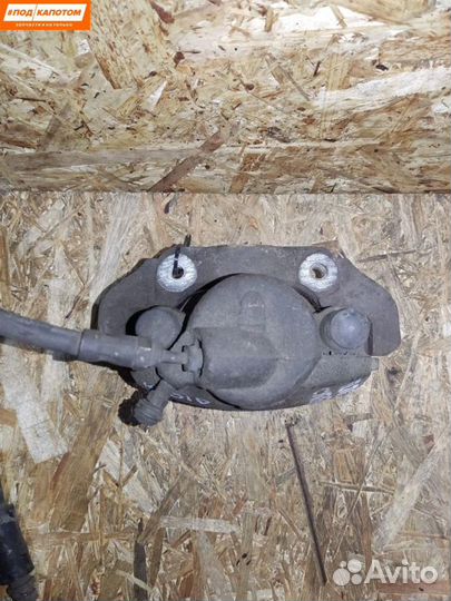 Суппорт тормозной передний правый Ford Fusion