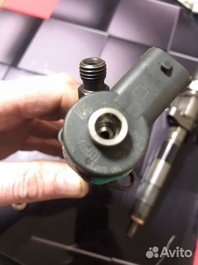 Форсунка топливная Bosch 0445110 084