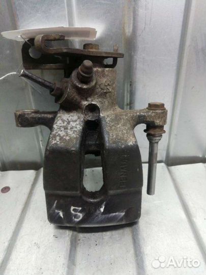 Суппорт тормозной задний левый Renault Megane 3