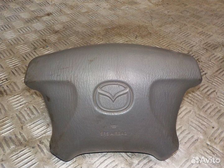 Подушка безопасности в рулевое колесо Mazda Demio