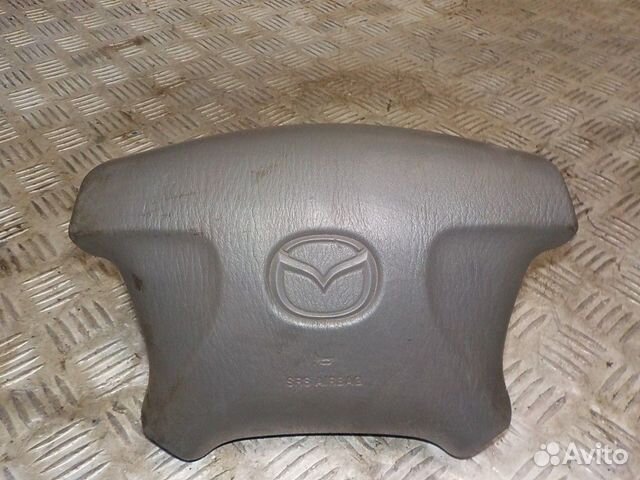 Подушка безопасности в рулевое колесо Mazda Demio