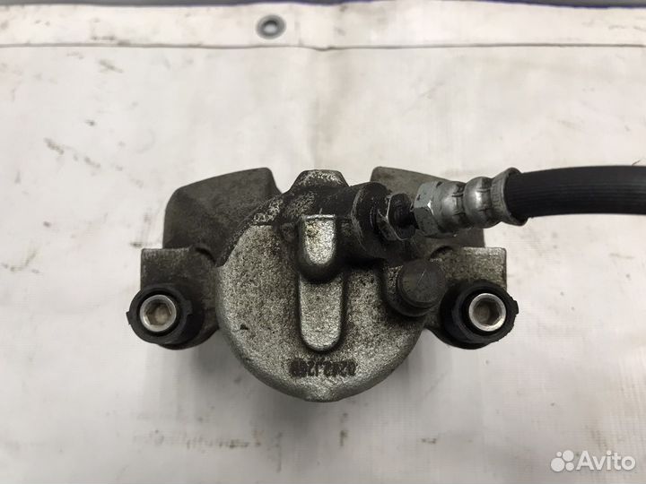 Суппорт передний правый Mazda 3 BL 1.6