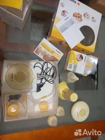 Молокоотсос medela электрический