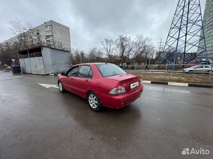 Mitsubishi Lancer 1.6 AT, 2005, 310 000 км