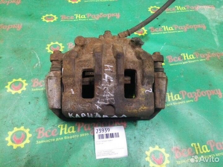 Суппорт передний правый Kia Carnival