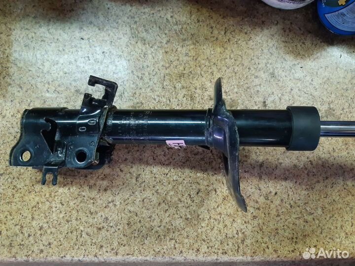 Амортизатор передний левый Nissan X-Trail T31