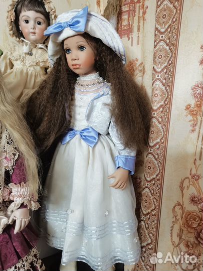 Коллекционная фарфоровая кукла