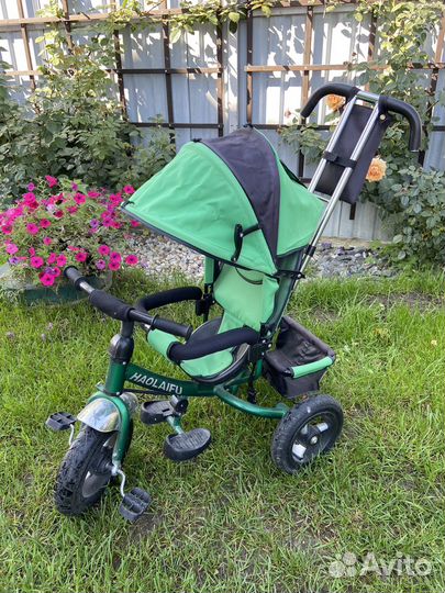 Трехколесный велосипед с ручкой