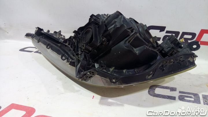 Фара головного света правая б/у для Honda Jazz (21