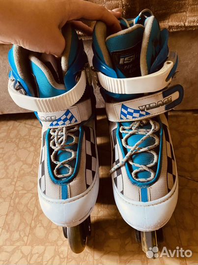 Роликовые коньки