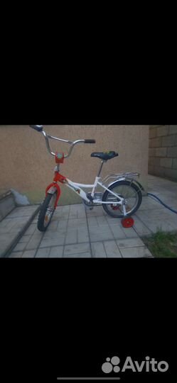 Детский велосипед четырехколесный