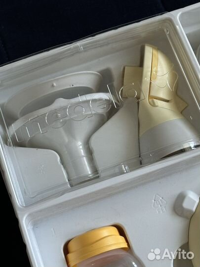 Молокоотсос medela электрический