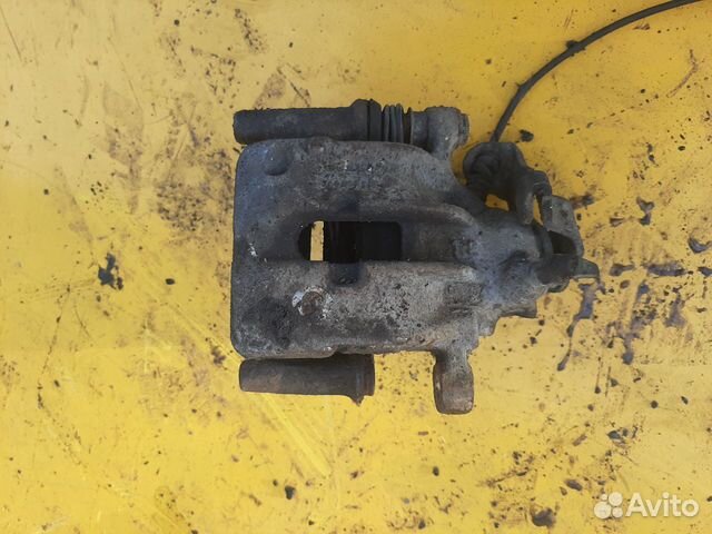 Суппорт задний правый VW Sharan