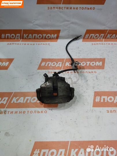 Суппорт тормозной передний левый Volkswagen Caddy