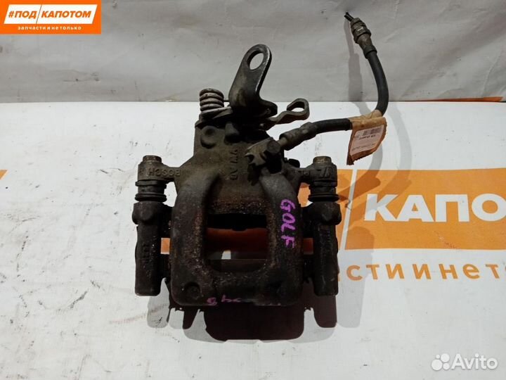 Суппорт тормозной задний левый Volkswagen Golf 6