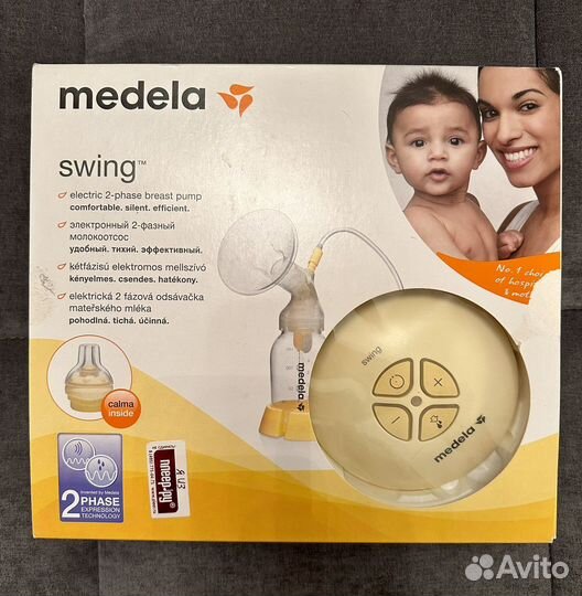 Молокоотсос medela swing
