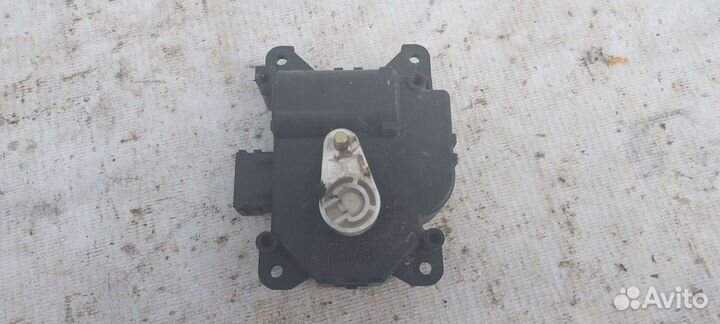 Моторчик заслонки печки Suzuki Liana