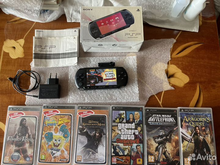 PSP E1008 прошитая и много игр 80 игр 64гб