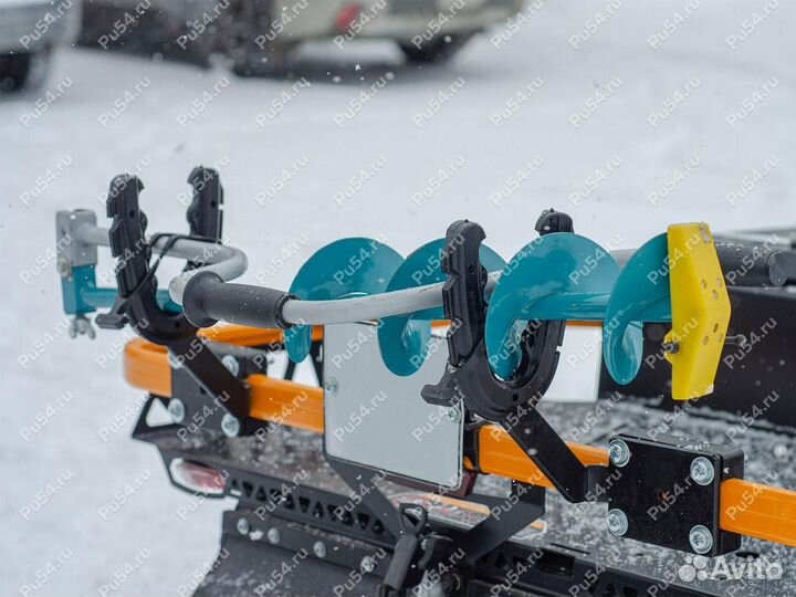 Крепление бура на снегоходе