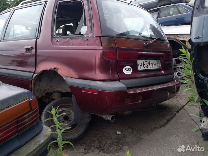 Бампер задний Mitsubishi Space Wagon 94год