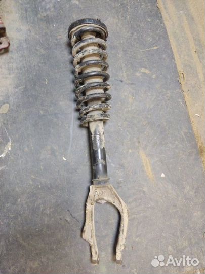 Стойка амортизатора передняя правая Honda Accord 7