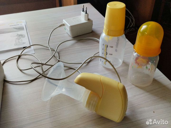 Молокоотсос medela электрический