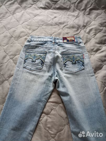 Джинсы клеш