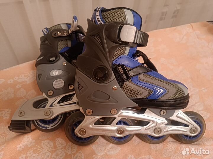 Роликовые коньки