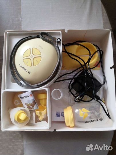 Молокоотсос medela электрический