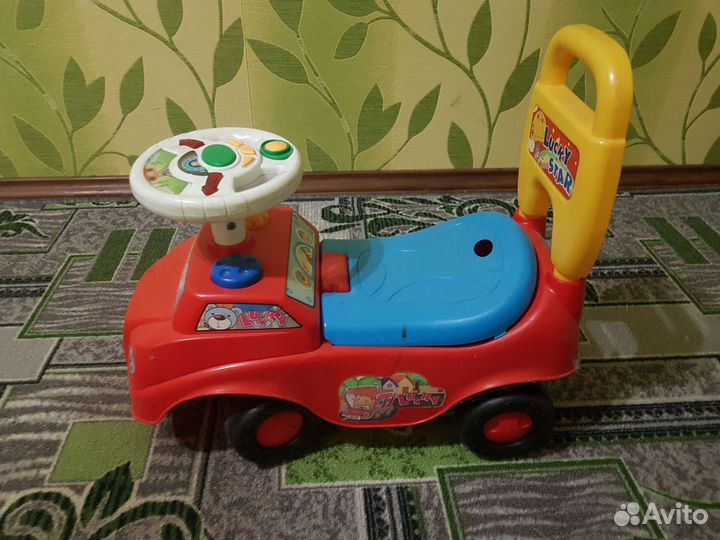 Развивающий автомобиль каталка